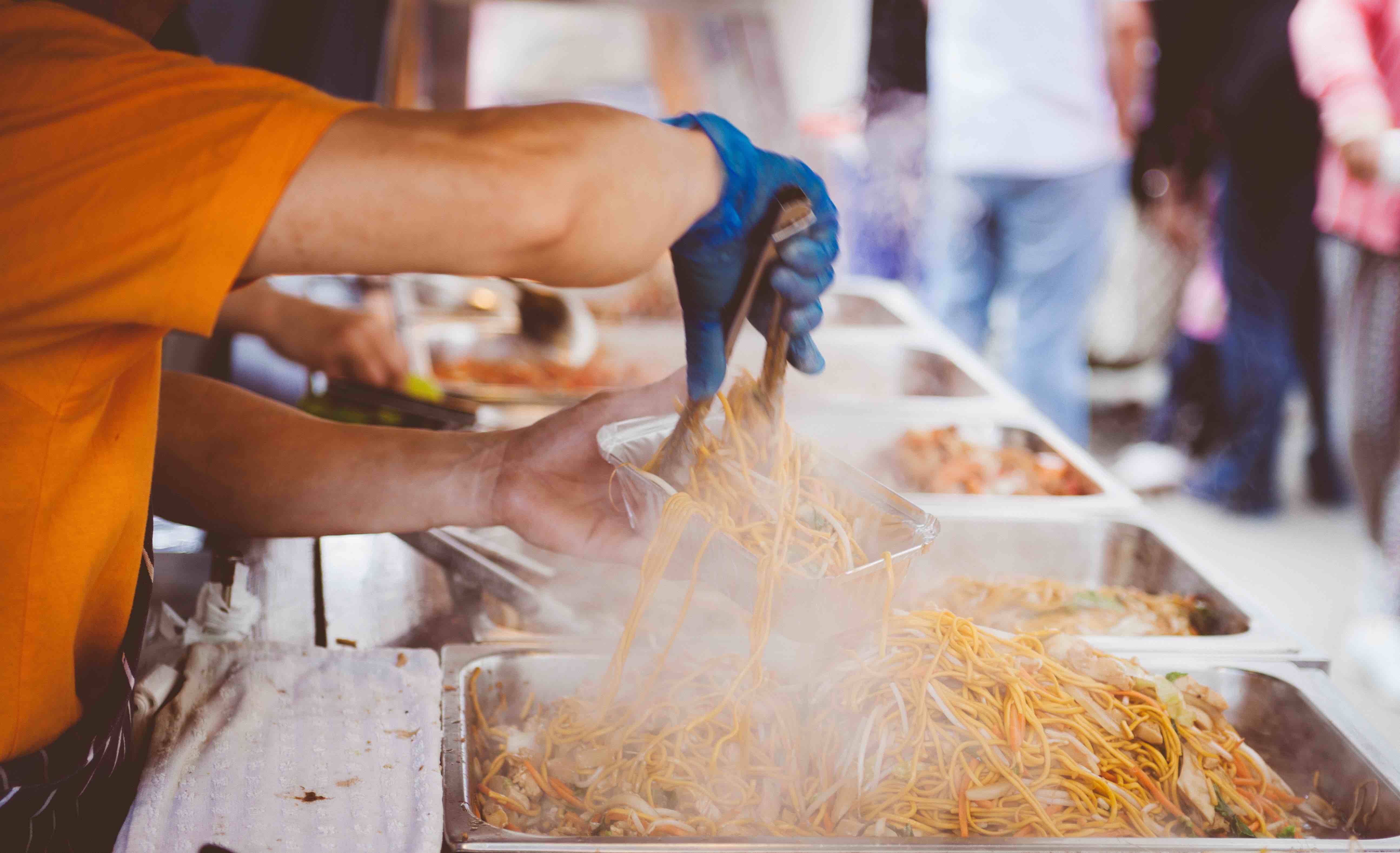 Food being served from a festival food vendor